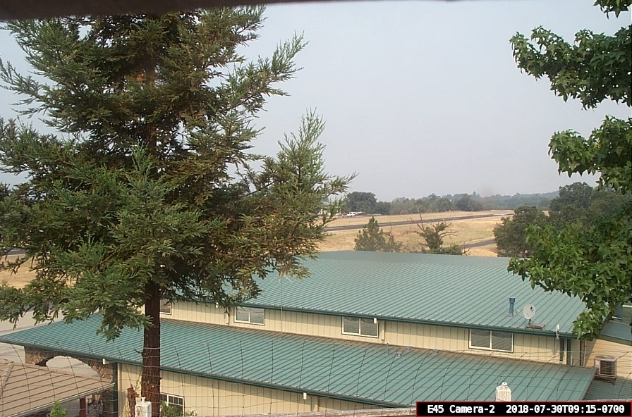 This is a camera-2 view of Pine Mountain Lake Airport looking towards the South-West at the end of runway 9.